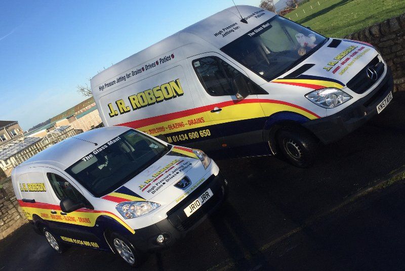 J R Robson drain clearance services van